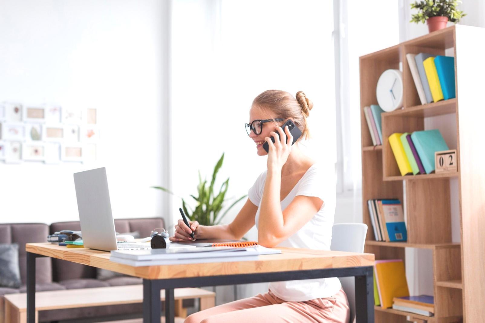 Financial planning workspace with budget categories displayed on laptop screen